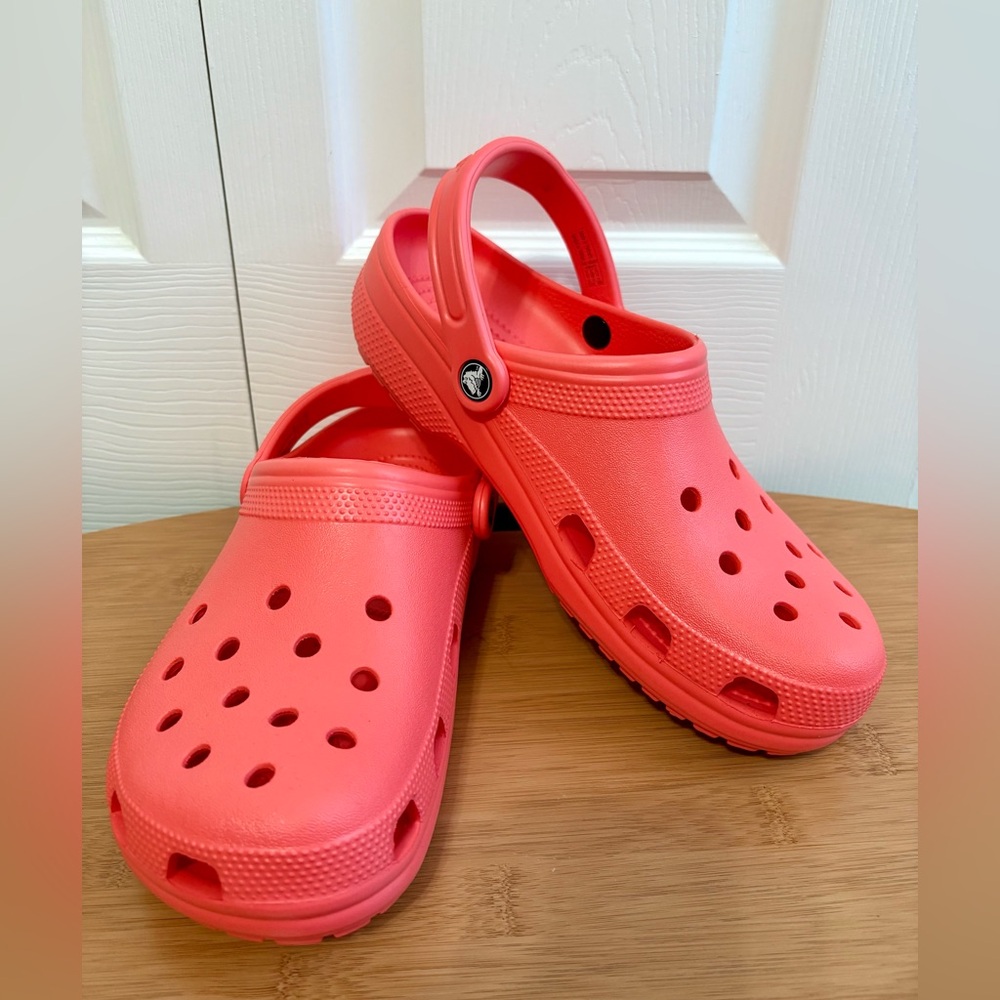Classic Crocs.  Orange Peach Women’s Size 11, Men’s size 9.